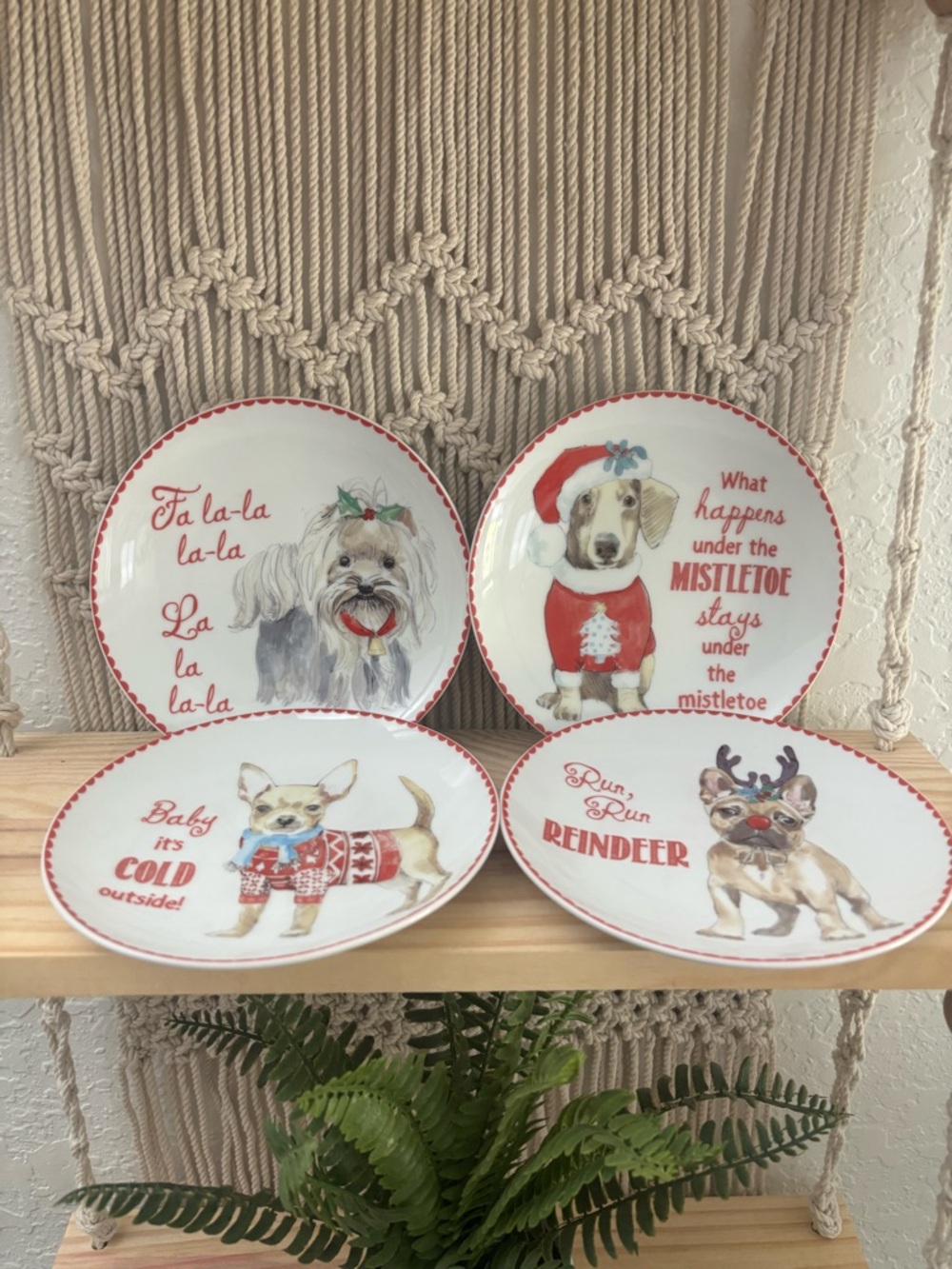 Set of 4 Pier 1 Christmas appetizer plates featuring festive holiday dog designs